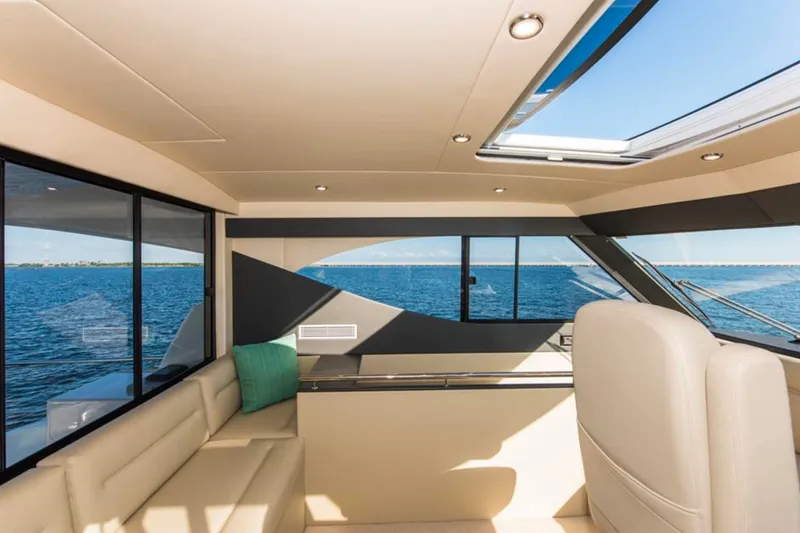 Slide: The Image of Luxurious interior of 2016 Maritimo M51 yacht with panoramic ocean views and elegant seating. - 10