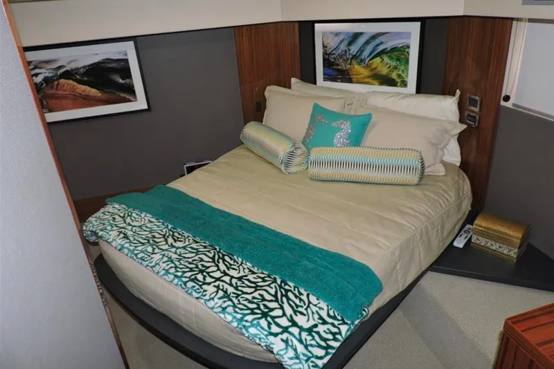 Slide: The Image of Luxurious bedroom interior of 2016 Maritimo M51 yacht with elegant decor and artwork. - 28