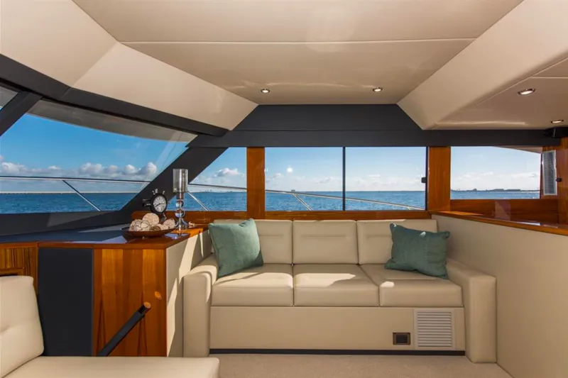 Slide: The Image of Luxurious interior of 2016 Maritimo M51 yacht with ocean view through large windows. - 27