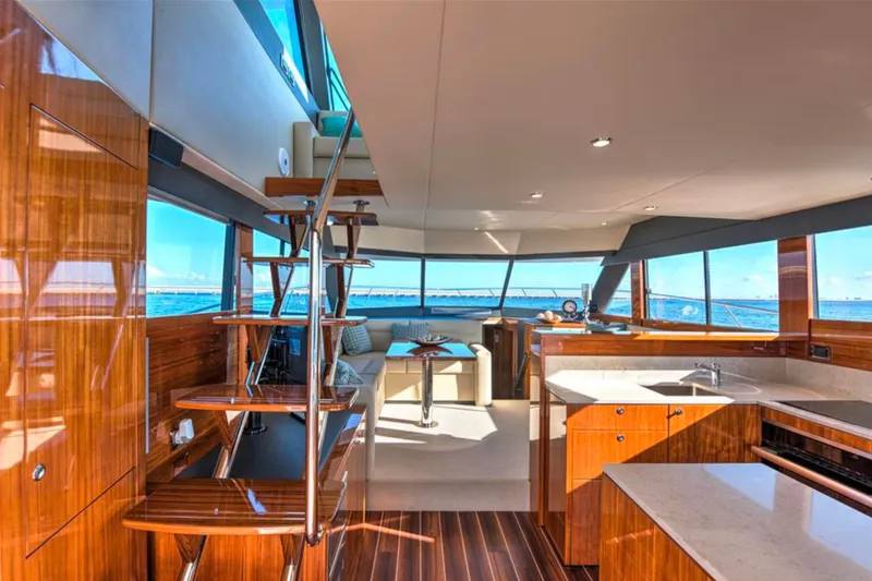 Slide: The Image of Luxurious interior of 2016 Maritimo M51 yacht with modern kitchen and ocean view. - 23