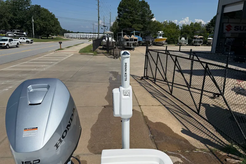 Slide: The Image of 2012 Sea Fox 200XT with Honda 150 engine and Minn Kota trolling motor on a sunny day. - 25