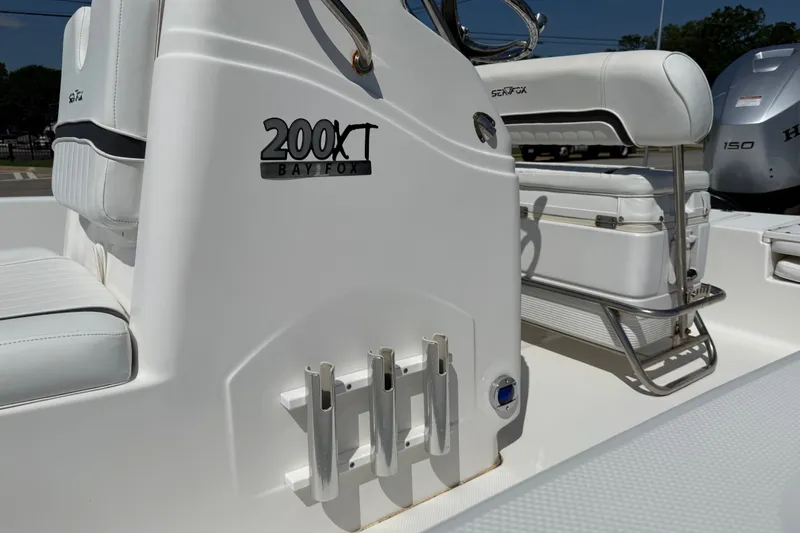 Slide: The Image of Sea Fox 200XT Bay Fox boat interior, featuring seating and rod holders, 2012 model. - 31