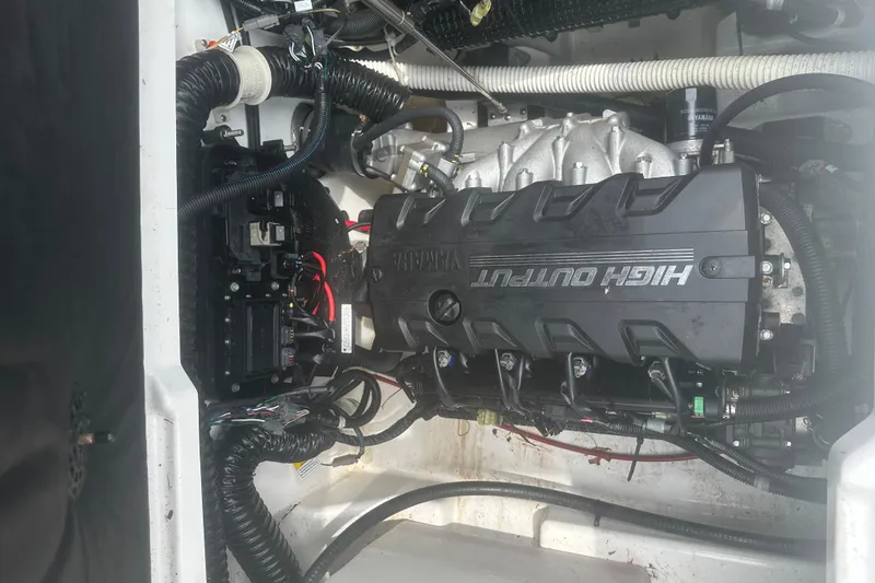 Slide: The Image of 2023 Yamaha Boats 252S engine compartment showcasing high output engine components. - 35