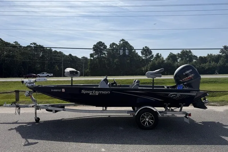The Image of 2023 G3 Sportsman 1710 boat on trailer, parked outdoors. - 1