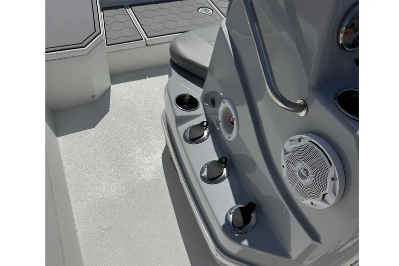 Slide: The Image of Control panel of 2022 Avid 21 FST boat with speaker and switches. - 17