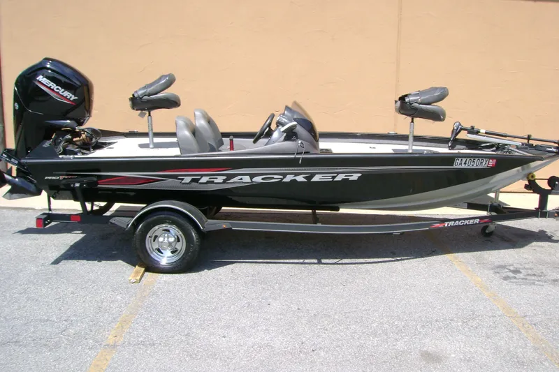 Slide: The Image of 2022 Tracker Pro Team 175 TXW fishing boat with Mercury engine on trailer. - 13