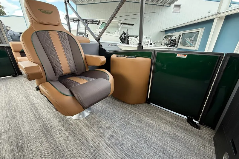 Slide: The Image of Luxurious seating on 2027 Bennington 22 M Quad Bench pontoon boat, featuring elegant design. - 9