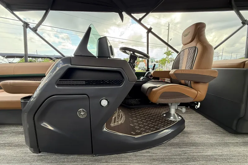 Slide: The Image of Luxurious interior of 2027 Bennington 22 M Quad Bench boat with premium seating and helm. - 12