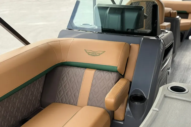 Slide: The Image of Luxurious seating on 2027 Bennington 22 M Quad Bench pontoon boat, featuring elegant upholstery design. - 4