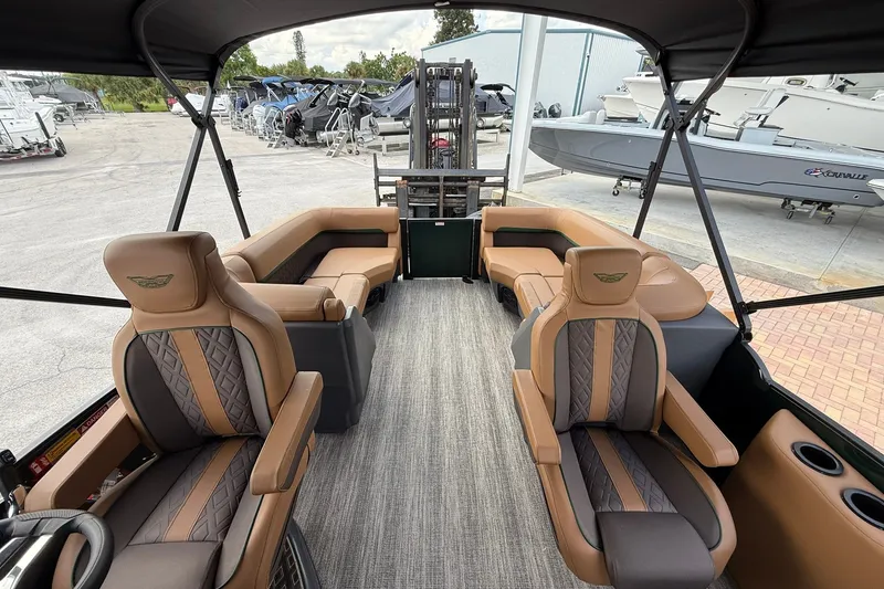 Slide: The Image of Interior of 2027 Bennington 22 M Quad Bench pontoon boat with luxurious seating. - 16