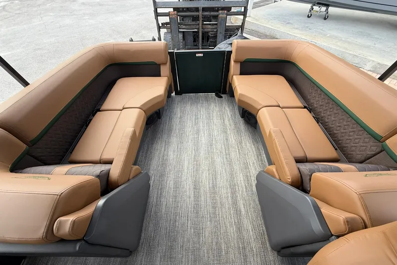 Slide: The Image of Luxurious seating on 2027 Bennington 22 M Quad Bench pontoon boat, featuring tan upholstery. - 17