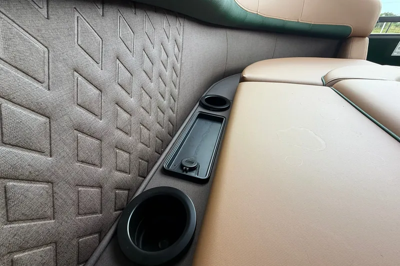 Slide: The Image of Luxurious seating with cup holders in 2027 Bennington 22 M Quad Bench boat. - 7
