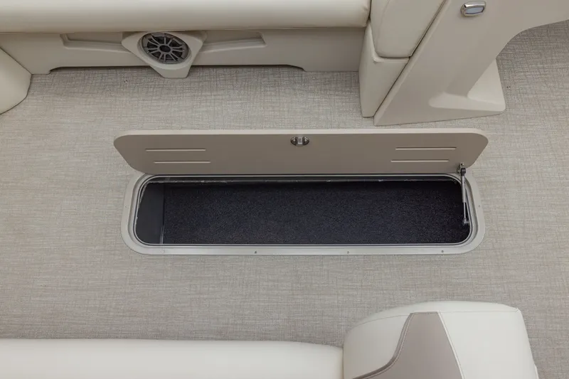 Slide: The Image of 2026 Tahoe Pontoon Cascade Cruise Rear Bench 23 interior storage compartment. - 15