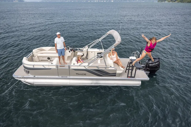 Slide: The Image of 2026 Tahoe Pontoon Cascade Cruise Rear Bench 23 on water, people enjoying leisure activities. - 17