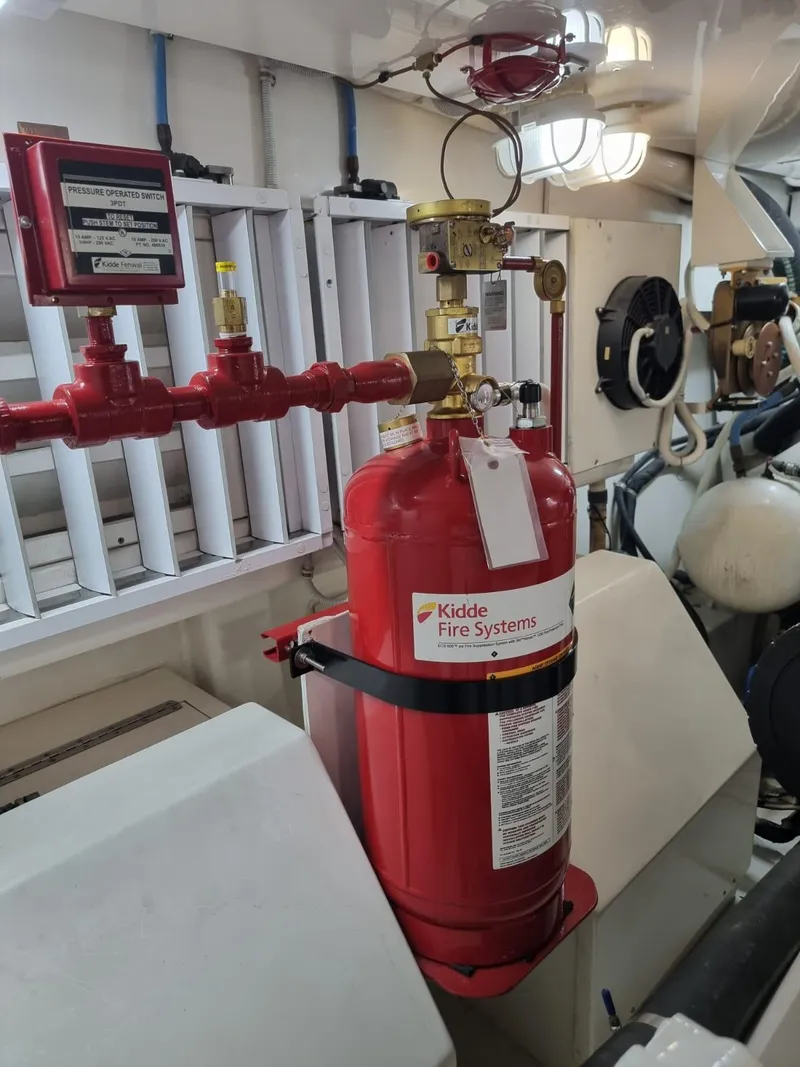 Slide: The Image of Kidde Fire Systems extinguisher in a 2008 Bertram 670 Convertible engine room. - 34