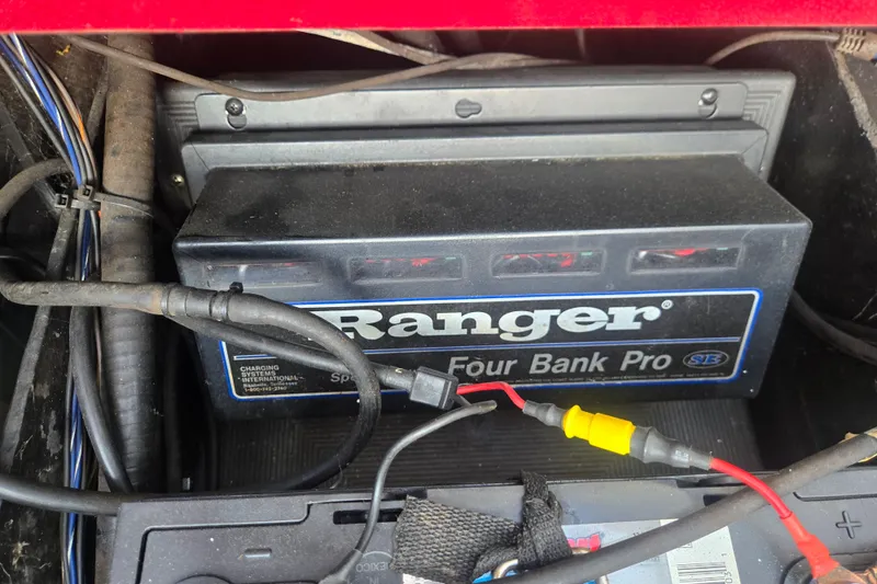 Slide: The Image of Ranger Z21 2007 model with Four Bank Pro battery charger in vehicle compartment. - 13