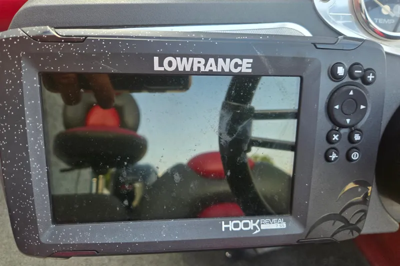 Slide: The Image of Lowrance Hook Reveal fish finder on 2007 Ranger Z21 boat dashboard. - 12