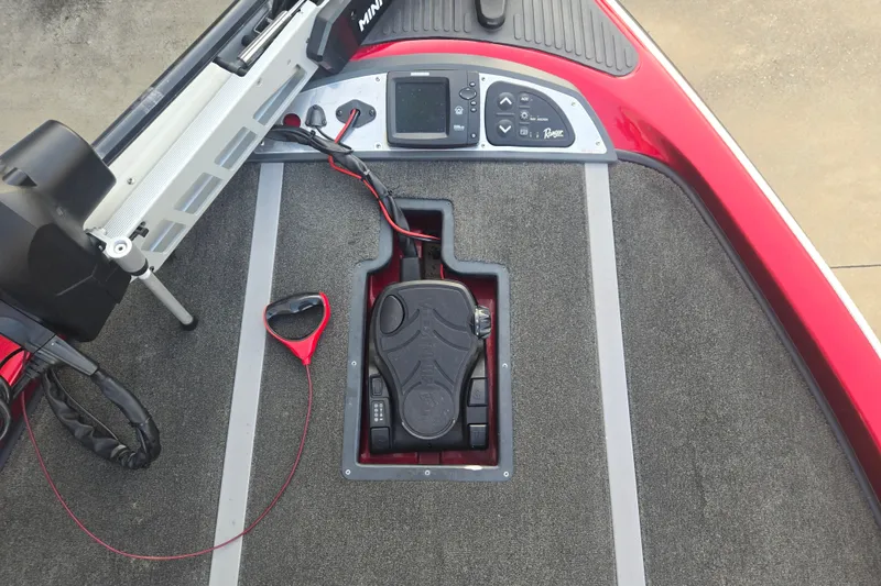 Slide: The Image of 2007 Ranger Z21 boat deck with trolling motor and control panel. - 7