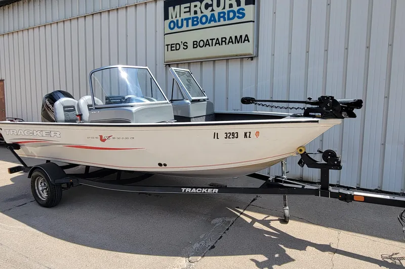 The Image of 2019 Tracker Pro Guide V-16 WT boat on trailer outside Ted's Boatarama. - 0