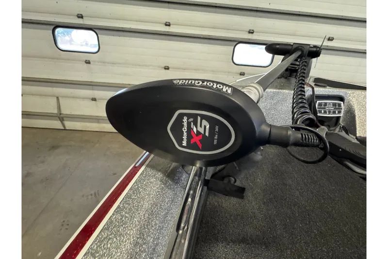 Slide: The Image of Trolling motor on a 2015 Nitro ZV21 boat in a garage setting. - 19