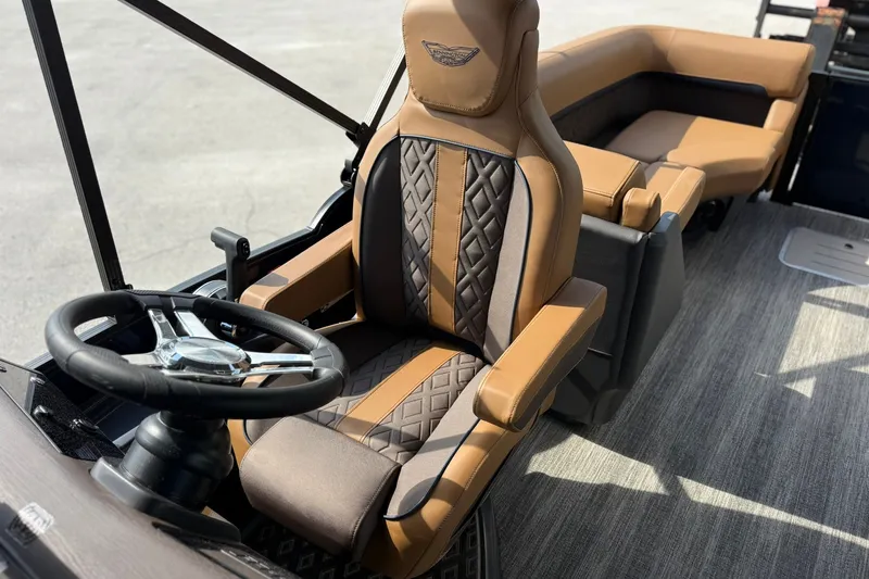 Slide: The Image of Luxurious interior of 2027 Bennington 24 M Quad Bench pontoon boat with plush seating. - 16