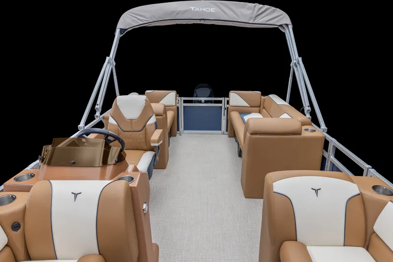 Slide: The Image of 2026 Tahoe Pontoon Sport Quad Lounger 21 with luxurious tan and white seating. - 2