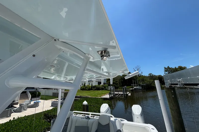 Slide: The Image of 2024 Invincible 33 Catamaran docked, showcasing sleek design and modern features. - 10