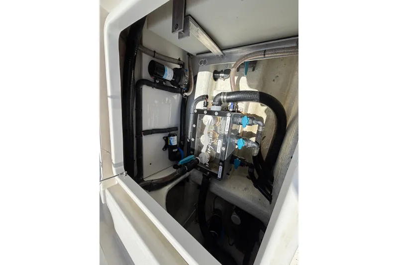 Slide: The Image of 2024 Invincible 33 Catamaran interior wiring and plumbing system detail. - 44