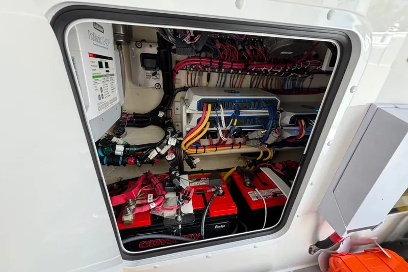 Slide: The Image of Electrical system of 2024 Invincible 33 Catamaran, showcasing batteries and wiring. - 5