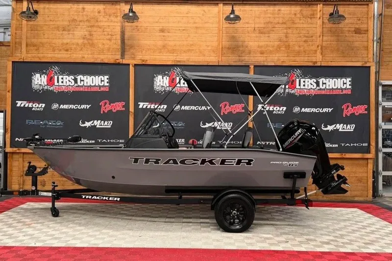 The Image of 2027 Tracker Pro Guide V-16 WT boat displayed at Angler's Choice showroom. - 0