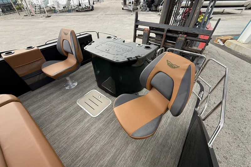 Slide: The Image of 2027 Bennington 24 M Fish and Cruise boat interior with seating and table. - 20