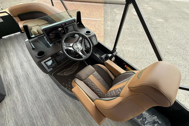 Slide: The Image of Interior of 2027 Bennington 24 M Fish and Cruise boat with luxurious seating and modern dashboard. - 9