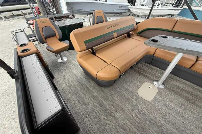 Slide: The Image of Interior of 2027 Bennington 24 M Fish and Cruise boat with tan seating and table. - 15