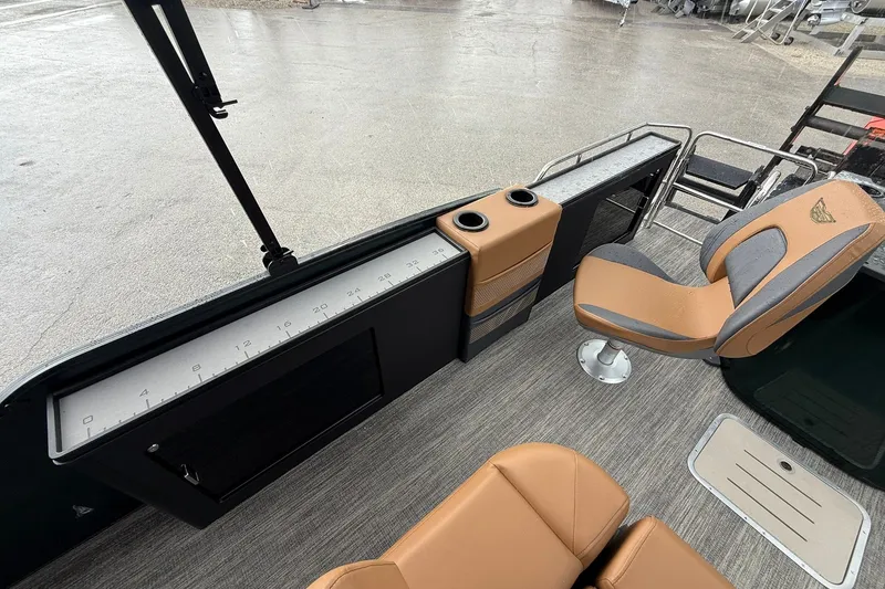 Slide: The Image of 2027 Bennington 24 M Fish and Cruise boat interior with seating and measuring board. - 16