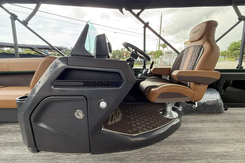Slide: The Image of Luxurious helm of 2027 Bennington 24 M Fish and Cruise pontoon boat with premium seating. - 8