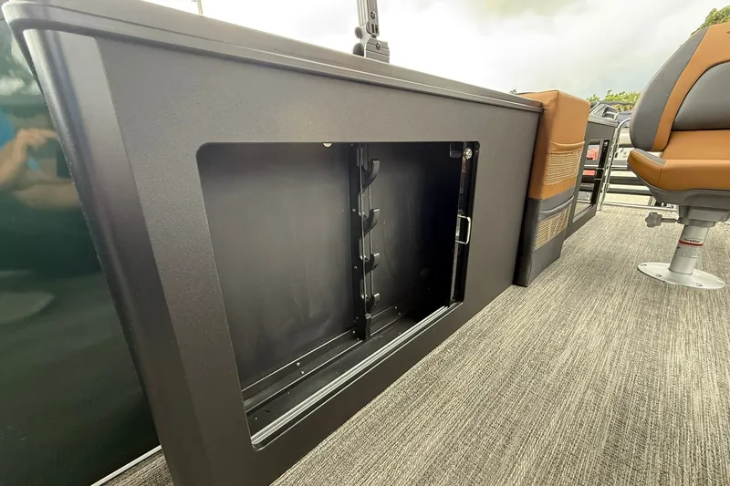 Slide: The Image of 2027 Bennington 24 M Fish and Cruise boat interior storage compartment and seating. - 18