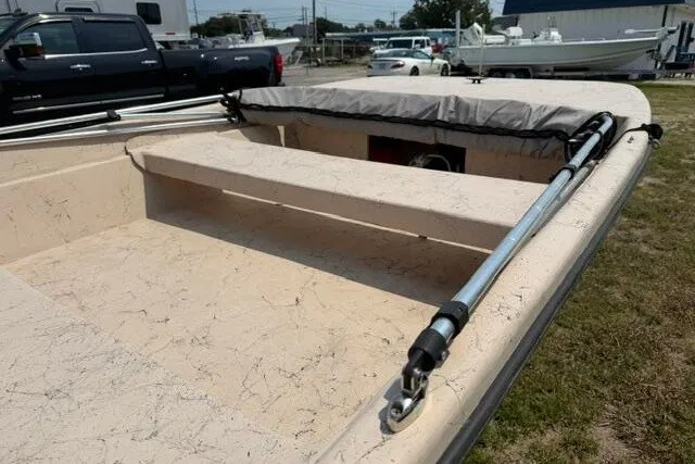Slide: The Image of 2003 Southern Skimmer 14 SKIFF boat with beige interior and metal fittings. - 5