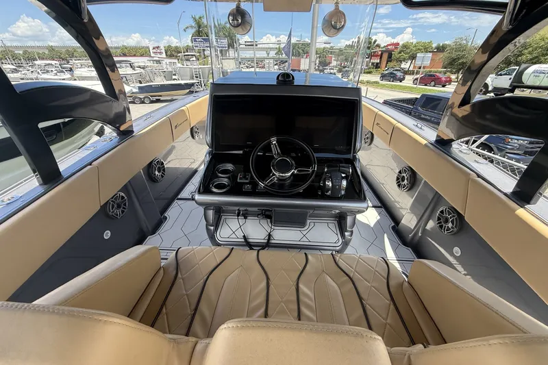 Slide: The Image of Interior view of a 2007 Midnight Express 37 Open boat with modern steering console. - 19