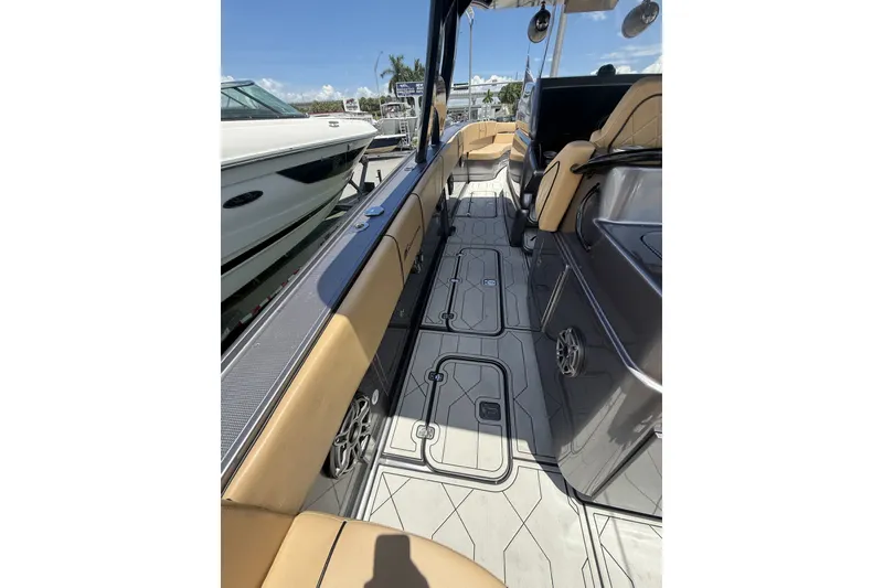 Slide: The Image of 2007 Midnight Express 37 Open boat interior with tan seating and sleek design. - 30
