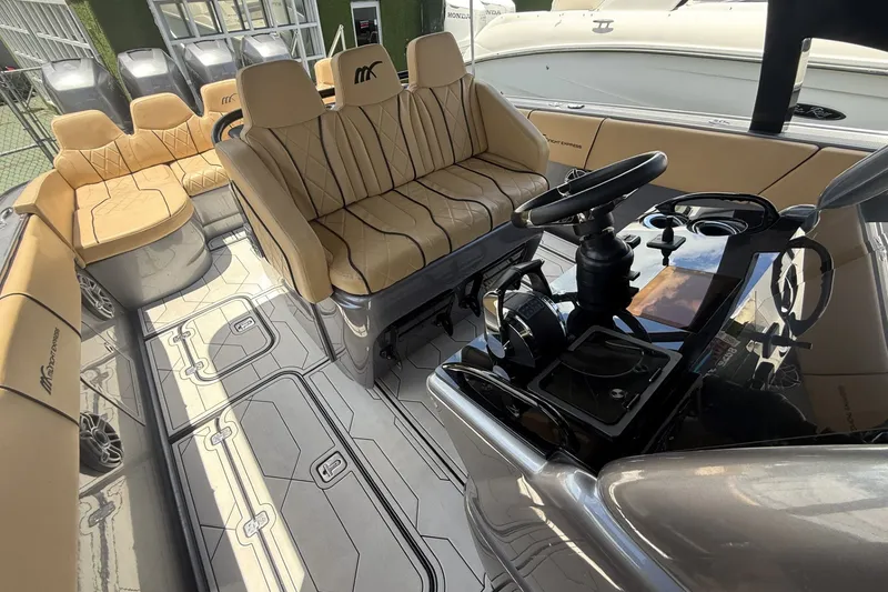 Slide: The Image of Luxurious interior of a 2007 Midnight Express 37 Open boat with plush seating and sleek controls. - 27