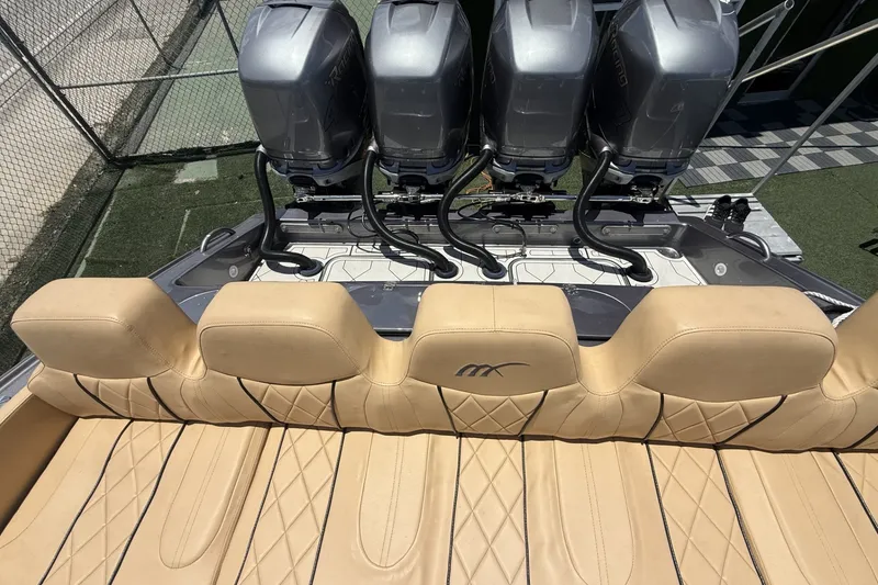 Slide: The Image of Luxurious 2007 Midnight Express 37 Open boat with quad engines and tan leather seating. - 26
