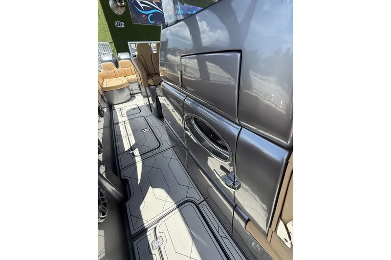 Slide: The Image of 2007 Midnight Express 37 Open boat interior with sleek design and modern seating. - 28