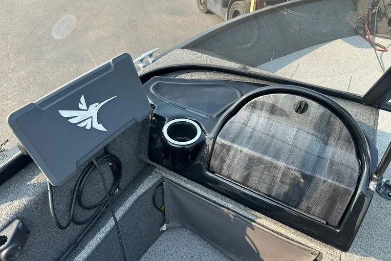 Slide: The Image of Dashboard of 2021 Starweld Fusion 16 DC boat with control panel and cup holder. - 6