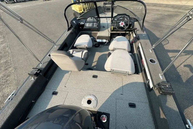 Slide: The Image of 2021 Starweld Fusion 16 DC boat interior with seating and steering console. - 4