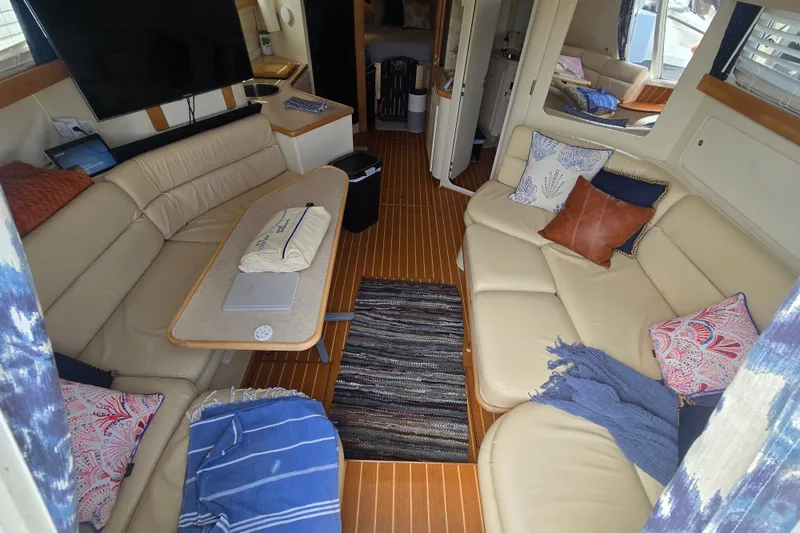 Slide: The Image of Interior of 1996 Carver 380 Santego yacht with cozy seating and modern decor. - 15