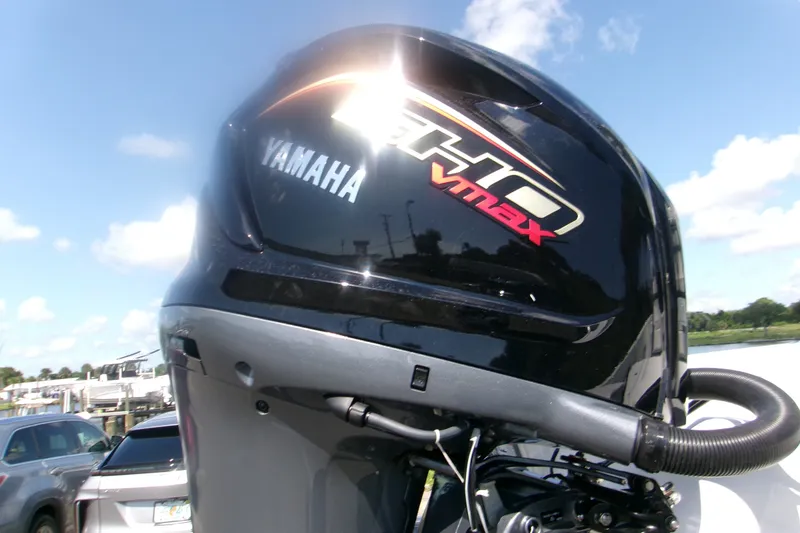 Slide: The Image of Yamaha VMAX outboard motor on 2027 Sportsman Masters 227 Bay Boat, sunny day background. - 15