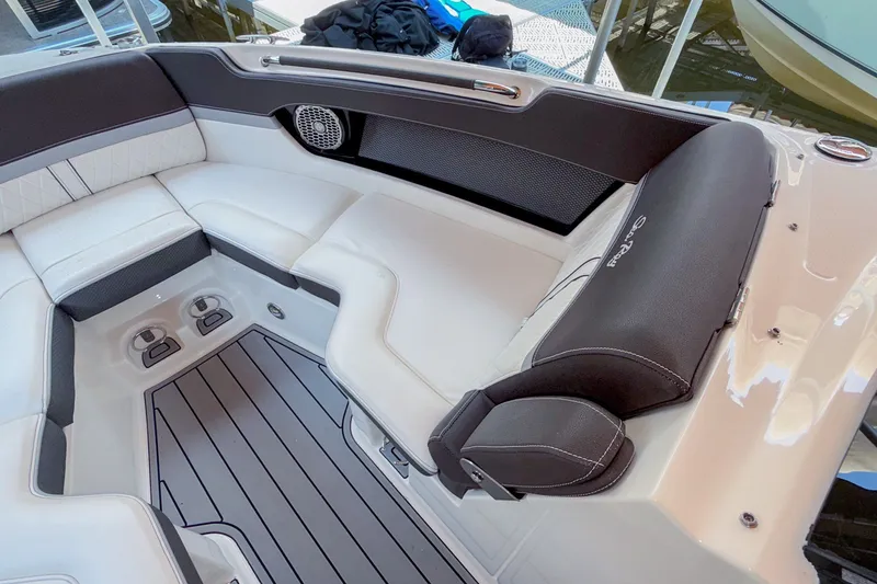 Slide: The Image of Luxurious interior of 2017 Sea Ray SLX 250 boat with plush seating and sleek design. - 15