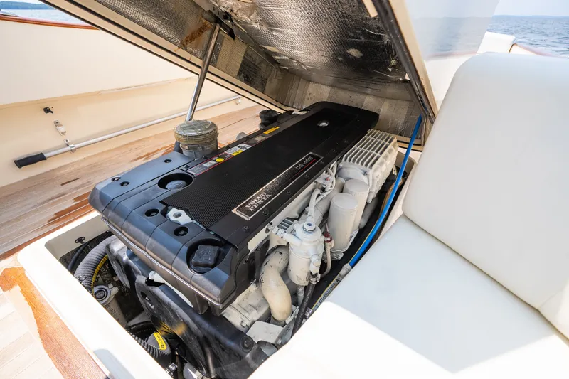 Slide: The Image of Engine compartment of 2008 Hinckley Talaria 29R, showcasing a Volvo Penta engine. - 44