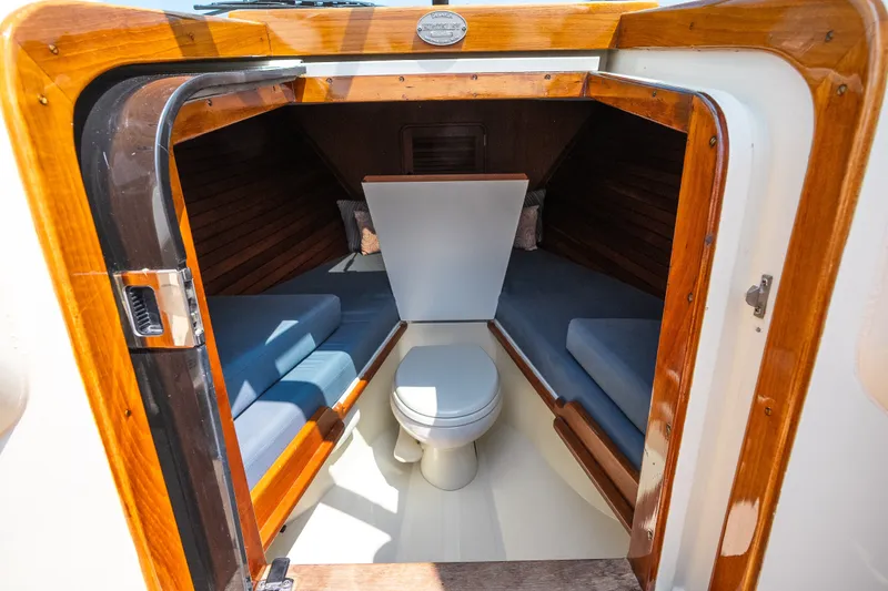 Slide: The Image of Interior cabin of 2008 Hinckley Talaria 29R with seating and toilet. - 34