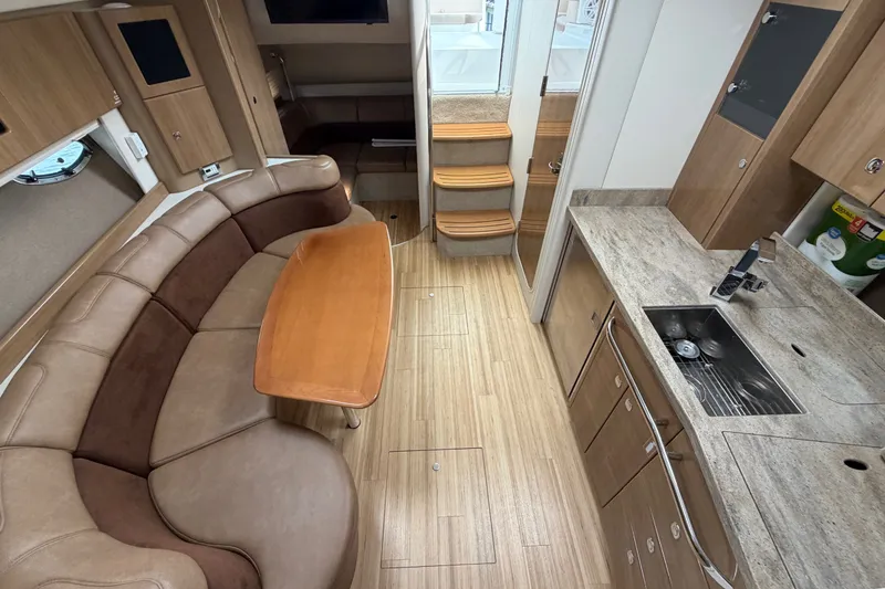 Slide: The Image of Interior of 2016 Formula 37 Performance Cruiser with modern kitchen and seating area. - 25